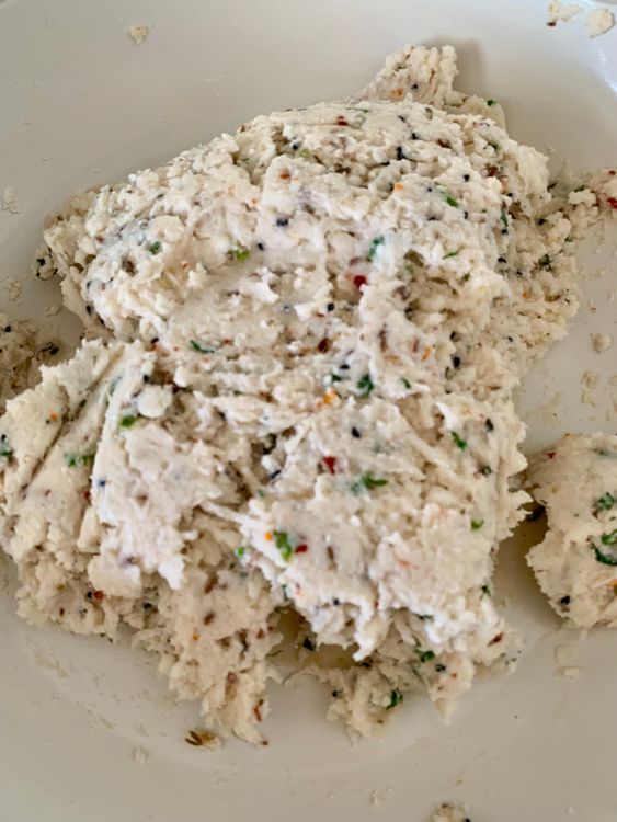 Step 1.2: Reduce the heat and gradually add rice flour, stirring continuously to form a soft dough-like mixture