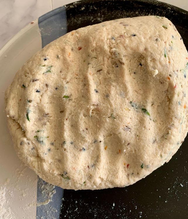 Step 1.1: Add oil and knead into a smooth, pliable dough while still warm