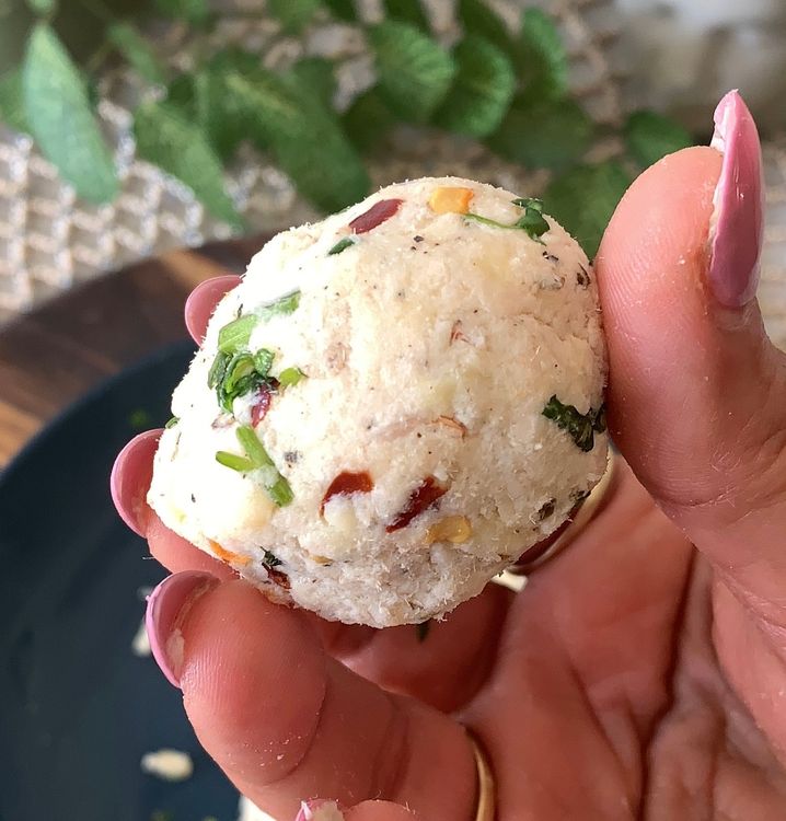 Step 1.1: Take small portions of the chicken and cheese mixture and shape them into lemon-sized balls
