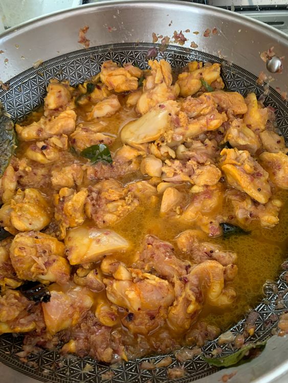 Step 3.1: Pour in hot water, bring to a boil, cover, and let it simmer on low heat until the chicken is tender