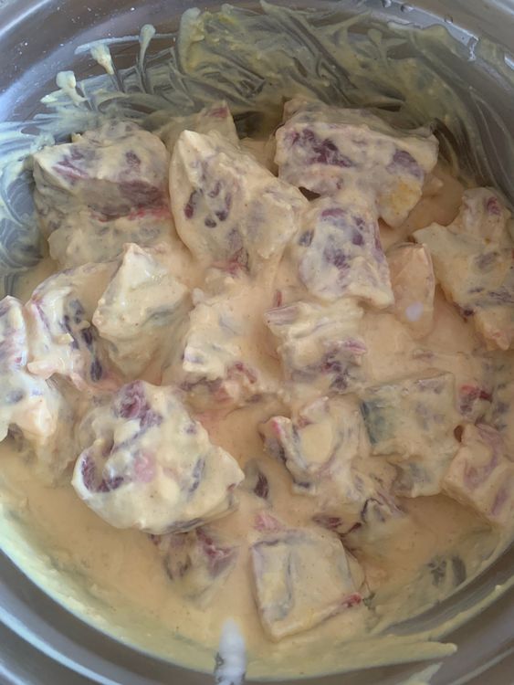 Step 1.1: Combine the mutton with yogurt, ginger-garlic paste, salt, turmeric, and cream in a large bowl