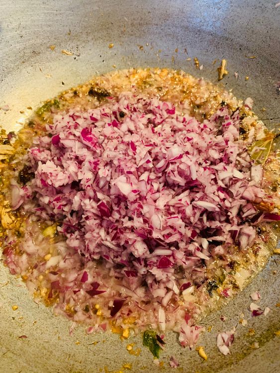 Step 2.1: Add chopped onions and cook until golden brown and the oil separates