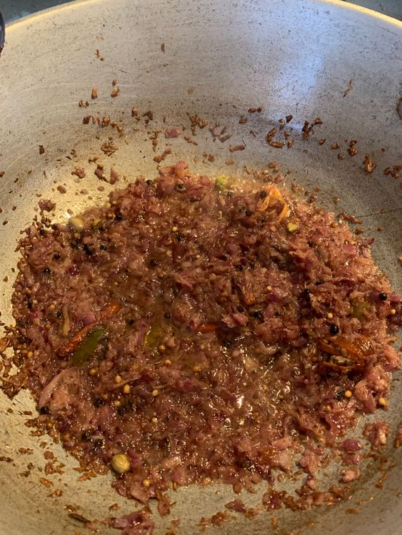 Step 2.2: Add chopped onions and cook until golden brown and the oil separates