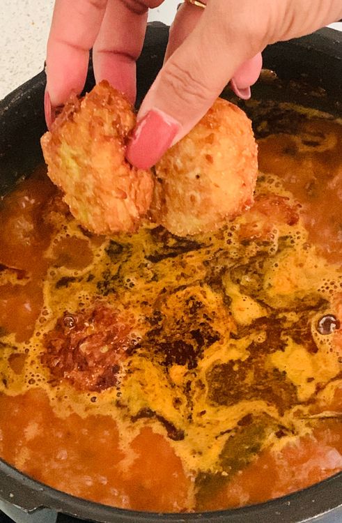 Step 2.1: Now add the fried koftas/balls to the gravy
