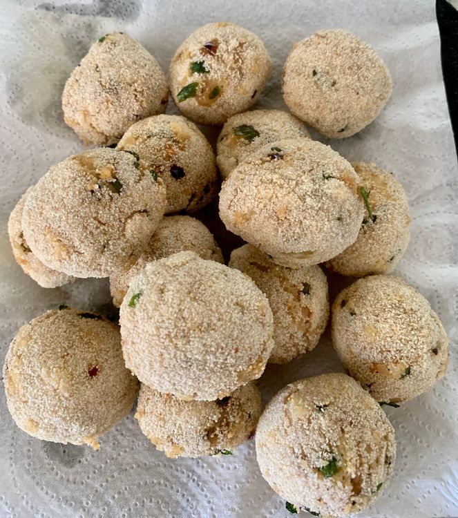 Step 1.1: Transfer the fried chicken balls to a plate lined with paper towels to absorb excess oil
