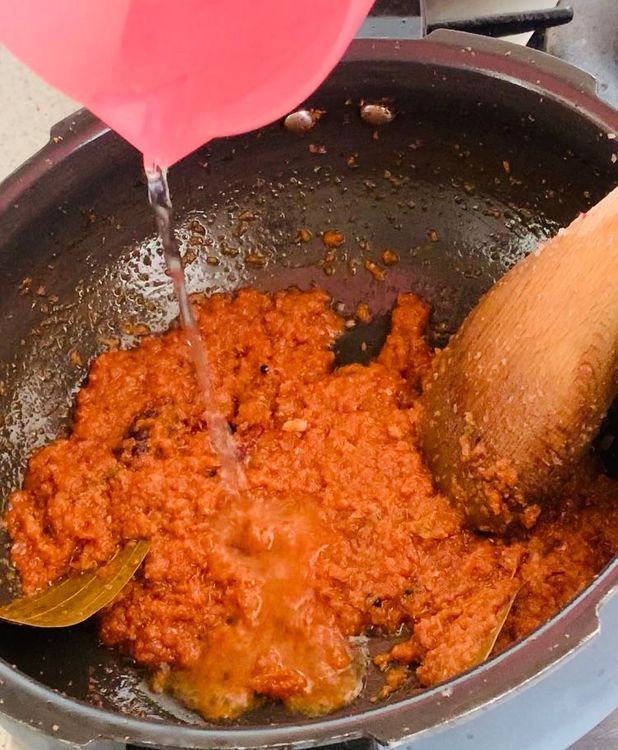 Step 2.1: Add kashmiri red chilli powder and mix well for a minute