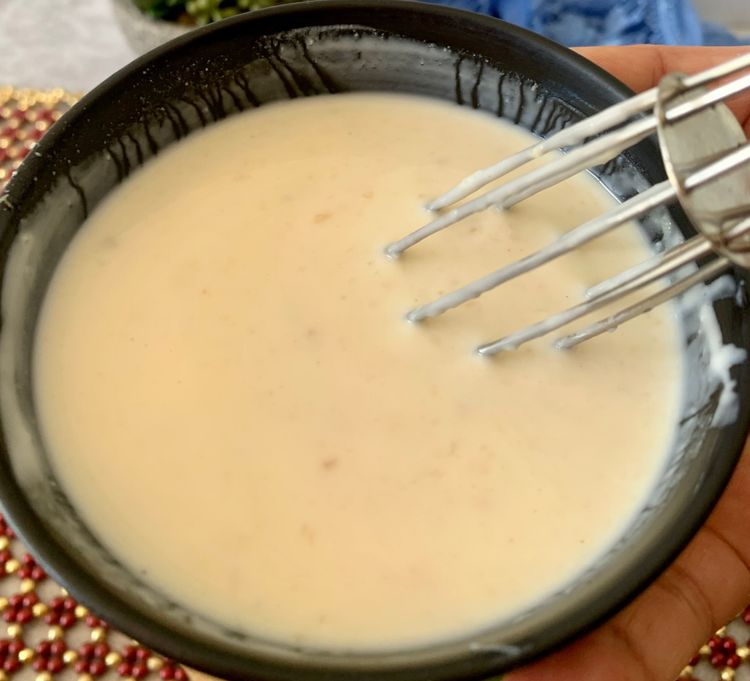 Step 1.2: In a separate bowl, combine curd, ginger garlic, and lemon juice