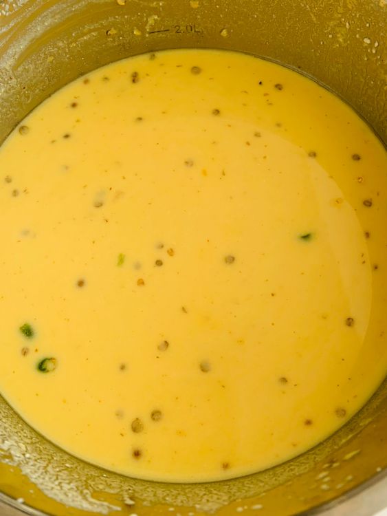Step 1.2: Add salt, turmeric, red chilli powder, coriander powder, fenugreek seeds, ginger, and green chillies