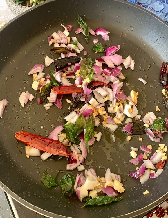 Step 3.1: Add the chopped onion, and sauté until the onions turn translucent