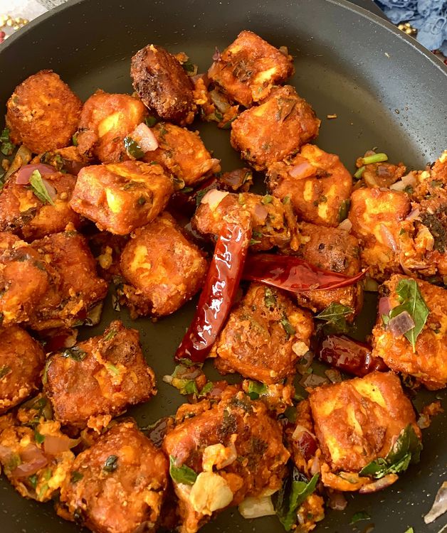 Step 3.1: Add the fried paneer cubes to the tempering mixture and toss them until they are well coated