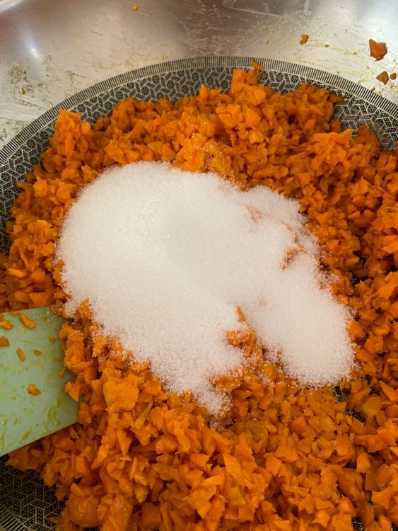 Step 1.1: Mix in the sugar and cook until it dissolves and the mixture begins to reduce