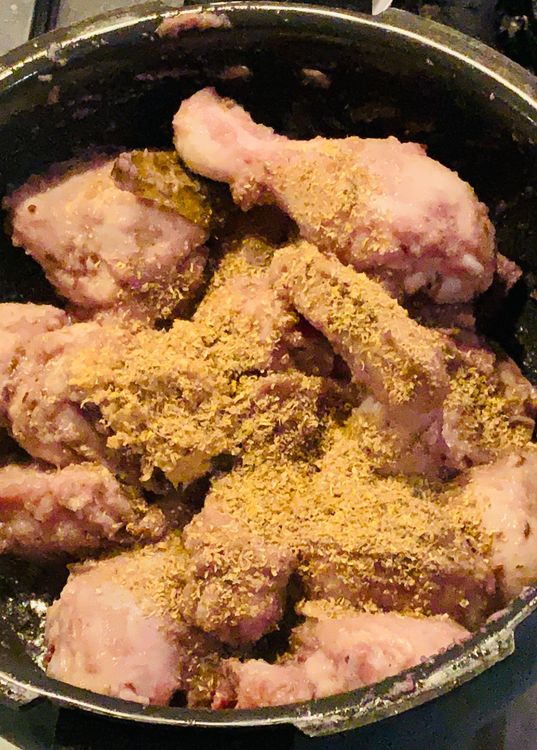 Step 1.1: Add ginger, garlic, and coriander powder, mix to combine and cook for 4-5 minutes on high heat until the chicken lightens in colour and oil starts to leave the sides of the wok