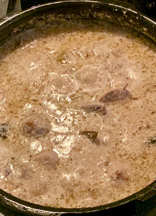 Step 1.2: Reduce the heat to simmer and cover the wok