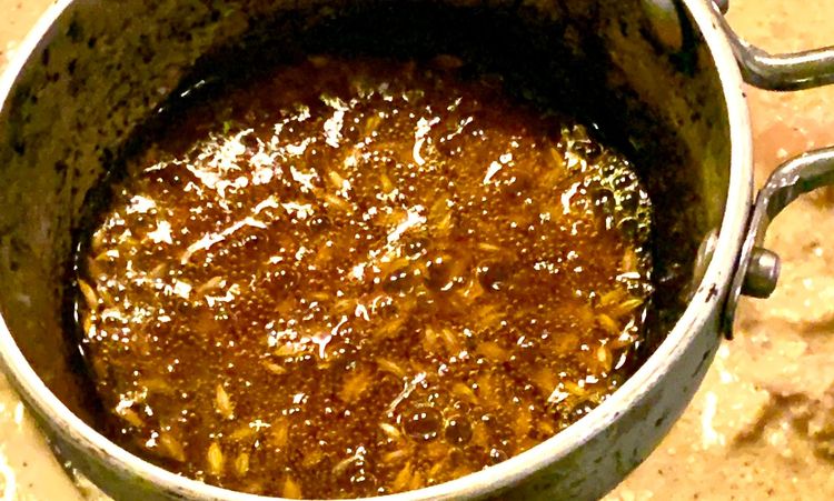 Step 2.1: Before serving, heat the ghee in a tiny frying pan, add cumin seeds, kashmiri red chilli powder, and then add it to the curry