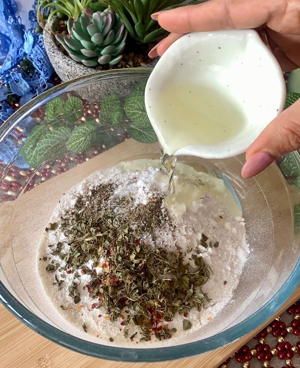 Step 1.2: Add rice flour, salt, red chilli flakes, black pepper powder, kasuri methi, and oil to the bowl