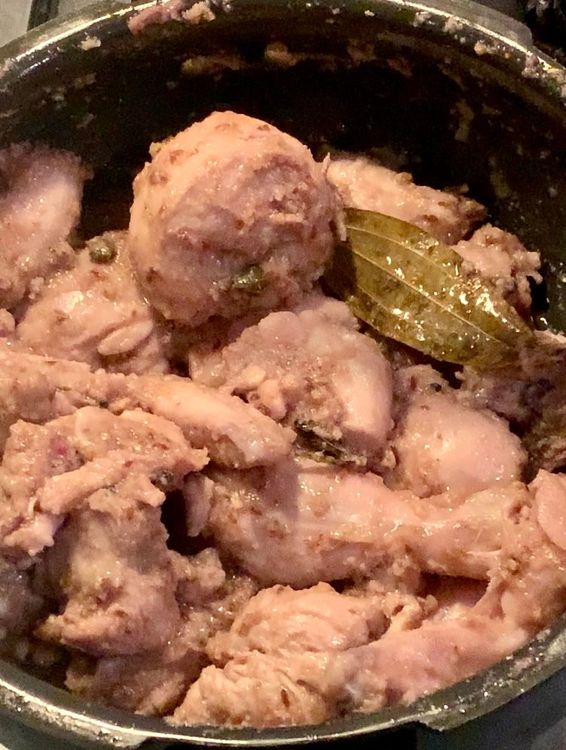Step 1.2: Add ginger, garlic, and coriander powder, mix to combine and cook for 4-5 minutes on high heat until the chicken lightens in colour and oil starts to leave the sides of the wok