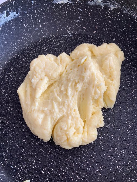 Step 1.1: Cook the mixture, stirring constantly, until it thickens and forms a smooth, dough-like consistency