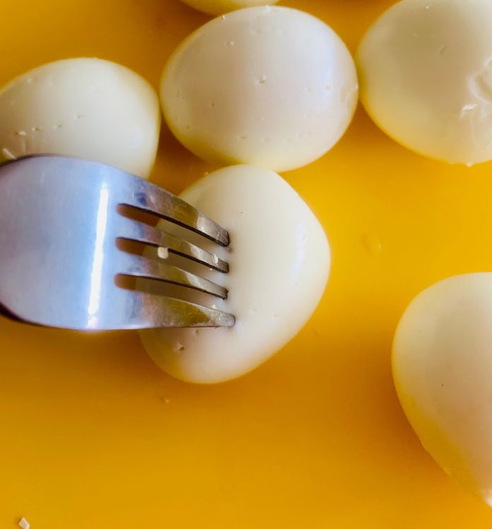 Step 2.1: Boil the eggs, shell them, and prick them with a fork or toothpick
