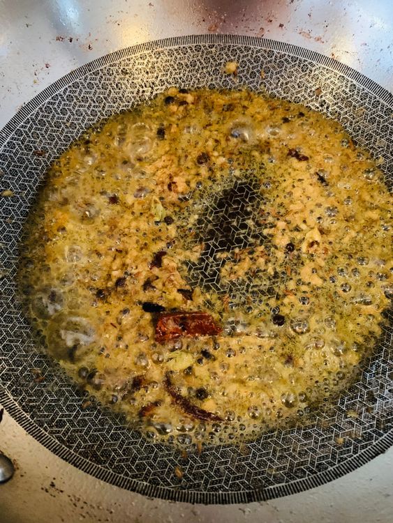 Step 3.1: Stir in ginger-garlic paste and cook until the raw smell disappears
