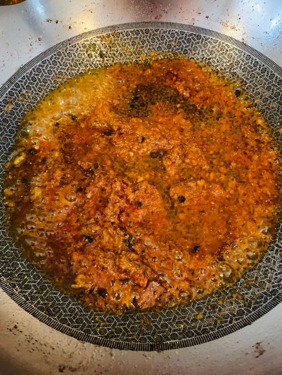 Step 3.2: Reduce the heat and add turmeric powder, Kashmiri chilli powder, coriander powder, cumin powder, and salt
