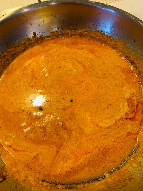 Step 3.2: Add the onion paste and cook until the oil separates from the masala