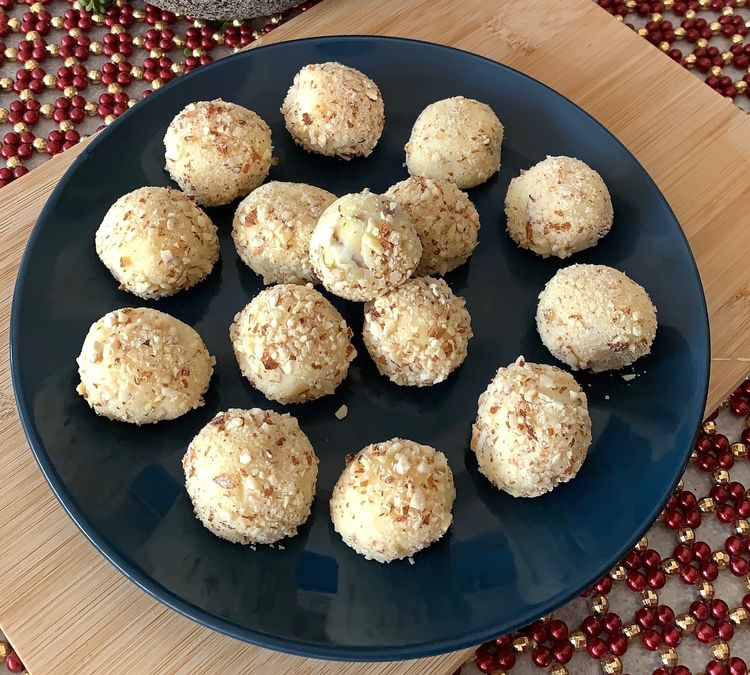 Step 1.1: Roll each ball in the powdered almonds/pistachios to coat them evenly