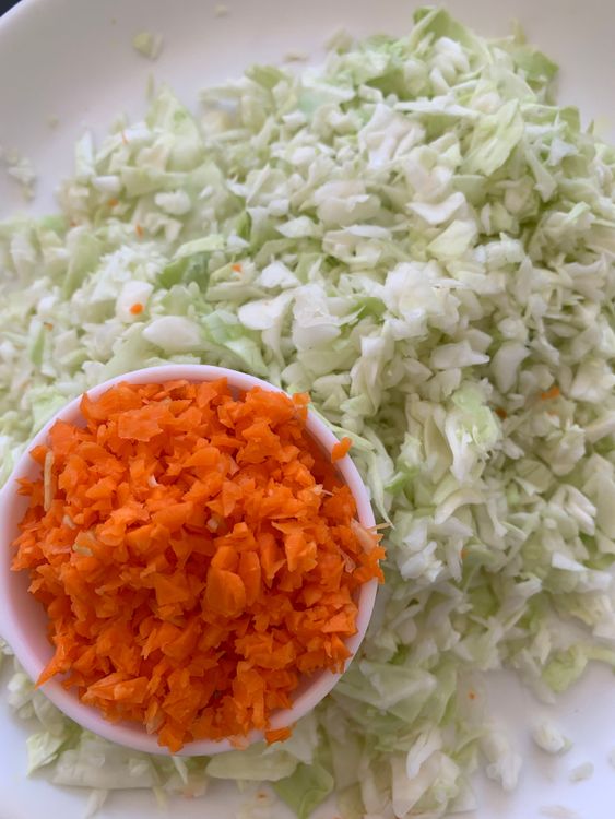 Step 1.1: Finely chop the cabbage and carrot using a knife or chopper