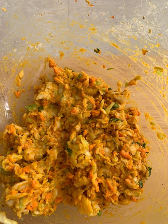Step 1.1: Gradually add gram flour and mix until well combined