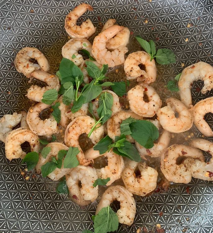 Step 1.1: Add the basil leaves and stir for a minute