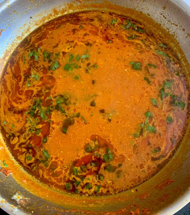 Step 2.1: Pour in water, season with salt, and add garam masala