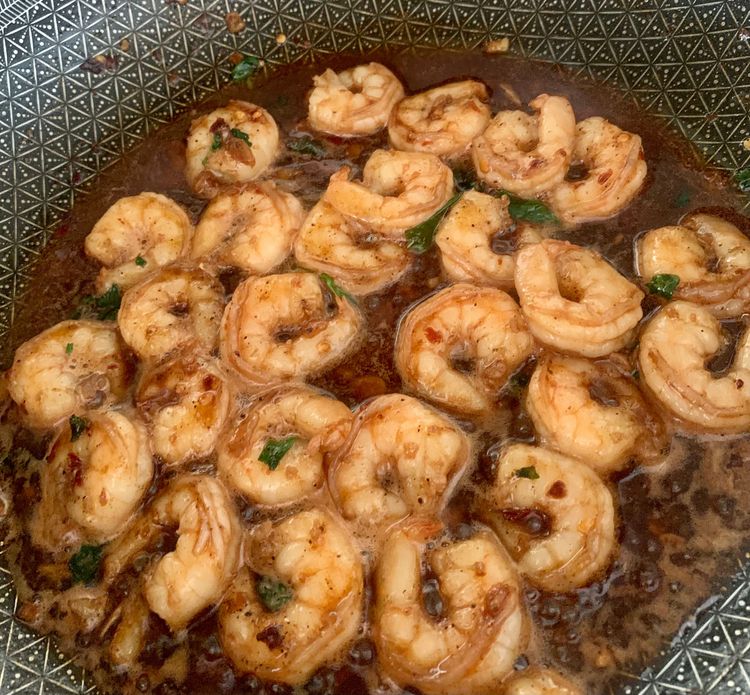Step 1.2: Return the cooked prawns to the skillet and coat them evenly with the balsamic glaze