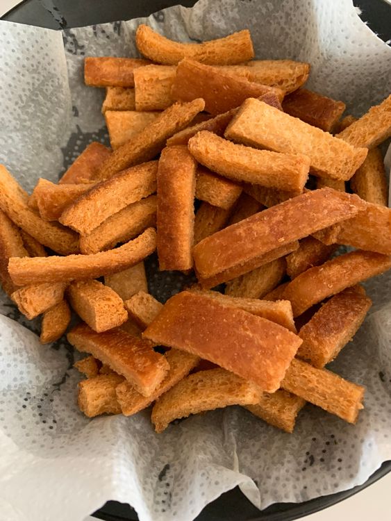 Step 1.2: Fry the bread pieces until golden brown and crisp