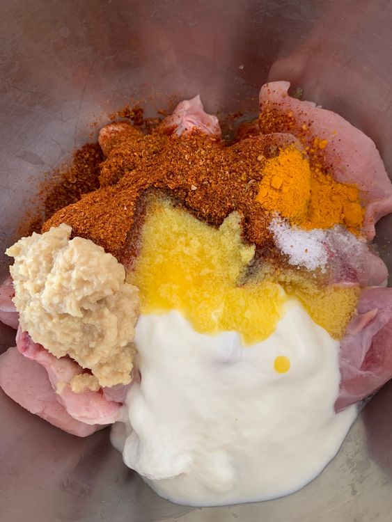 Step 1.1: Marinate the chicken pieces with the ground spices, ginger garlic paste, turmeric powder, lemon juice, yogurt, salt and ghee