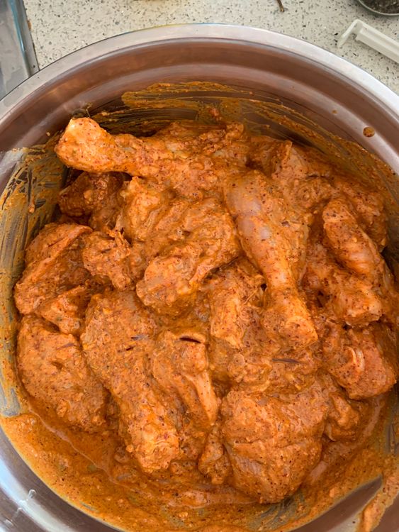 Step 1.2: Marinate the chicken pieces with the ground spices, ginger garlic paste, turmeric powder, lemon juice, yogurt, salt and ghee