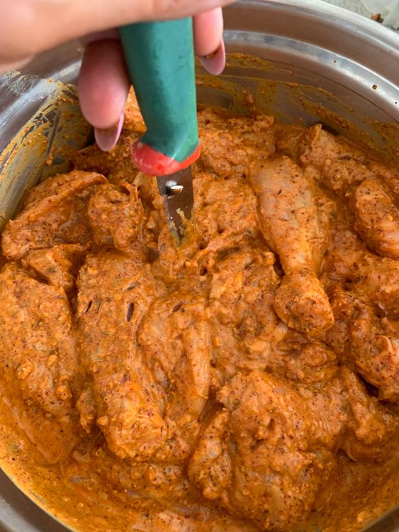 Step 1.3: Marinate the chicken pieces with the ground spices, ginger garlic paste, turmeric powder, lemon juice, yogurt, salt and ghee
