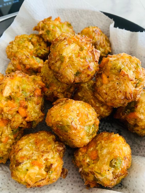 Step 1.2: Heat oil in a deep pan over medium heat and fry the balls until golden brown