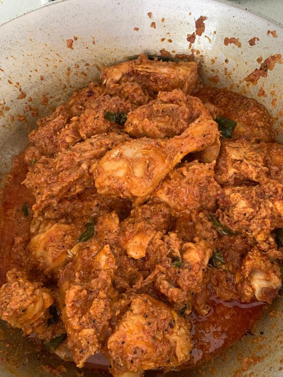 Step 1.2: Add the marinated chicken to the wok, mix well and cook for a few minutes