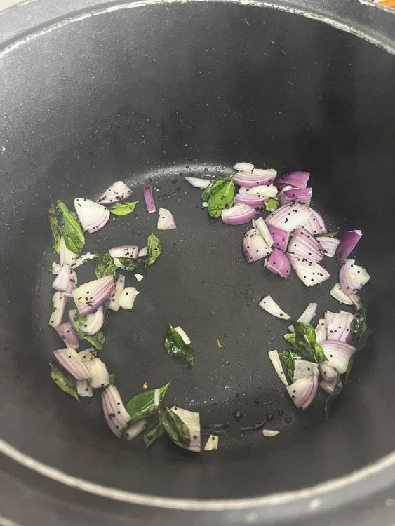 Step 2.1: Add onion and sauté until it turns pink