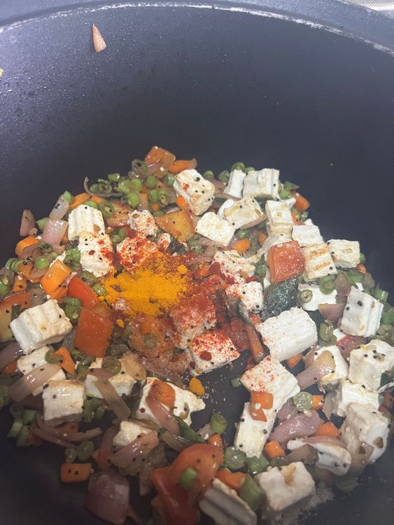 Step 2.1: Add salt, chilli powder, and turmeric powder and mix well