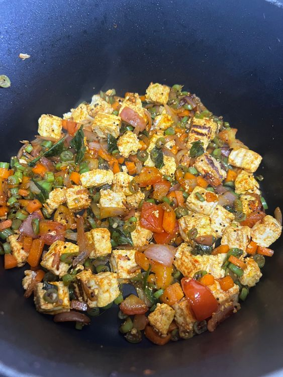 Step 2.2: Add salt, chilli powder, and turmeric powder and mix well