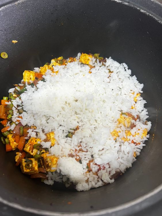 Step 2.1: Add boiled rice into the mixture and mix well