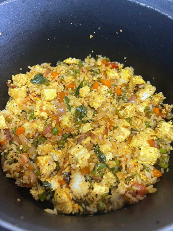 Step 2.2: Add boiled rice into the mixture and mix well