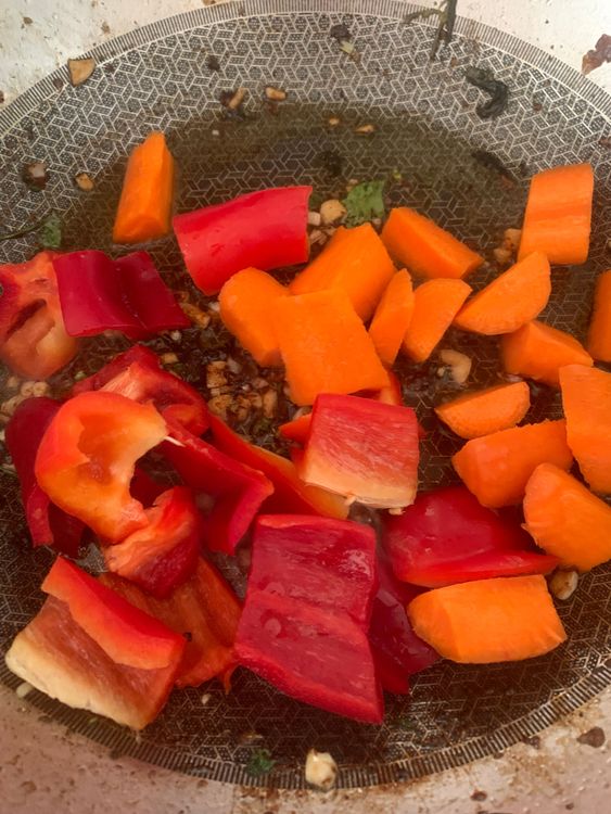 Step 1.1: Add the cubed capsicum and carrot; saute until slightly crispy