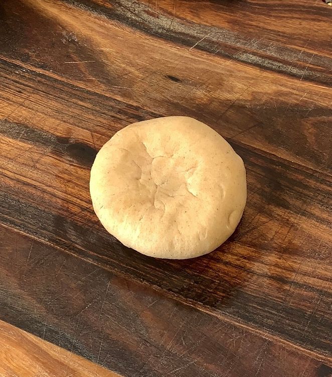 Step 2.1: Divide the dough into balls, and roll each into a small disc