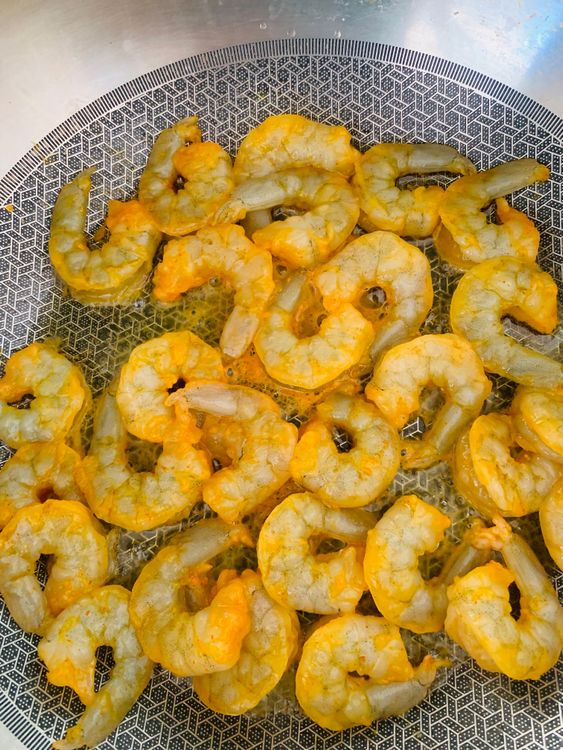 Step 1.1: Cook the marinated prawns in the skillet until slightly golden