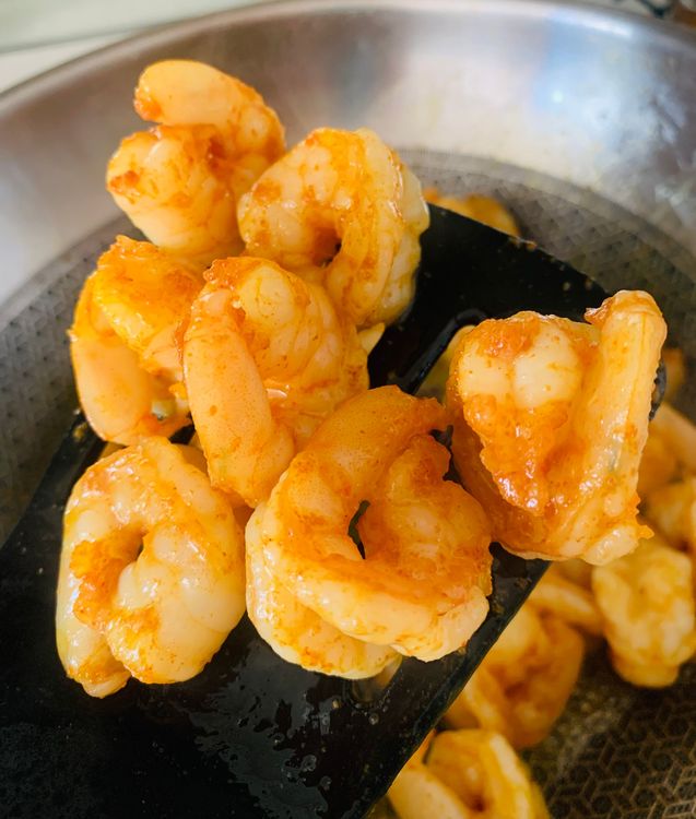 Step 1.2: Cook the marinated prawns in the skillet until slightly golden