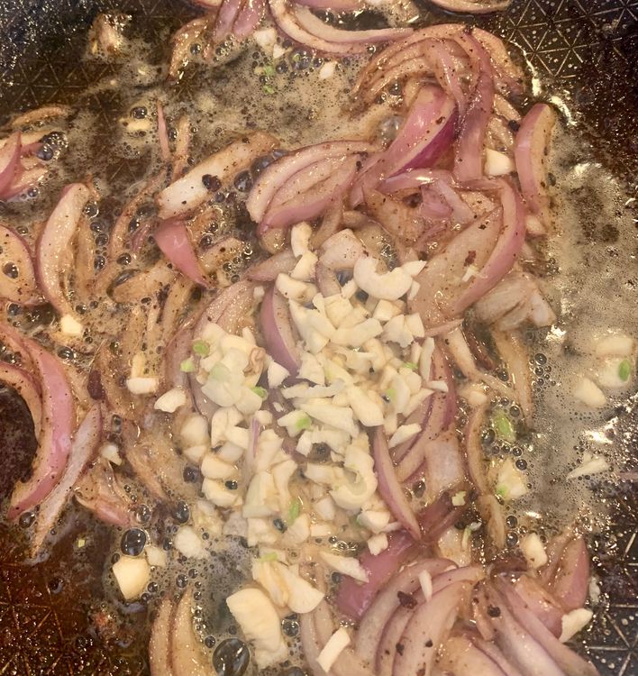 Step 1.1: In the same pan, add the sliced onions and cook until they become translucent