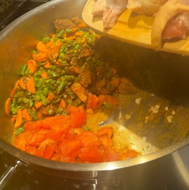 Step 1.1: Move the veggie masala to the outer edge of the pot