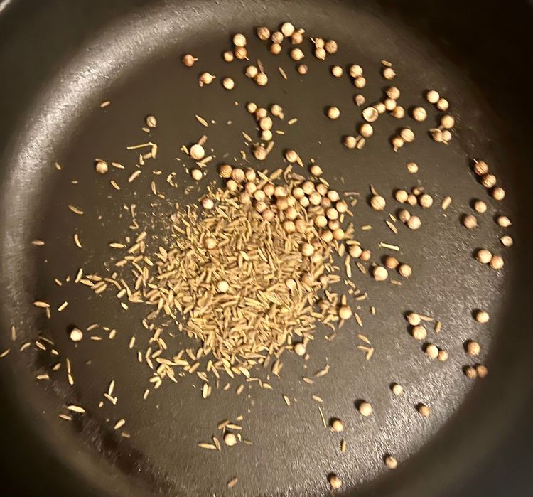 Step 1.1: Add the cumin and coriander seeds and let toast