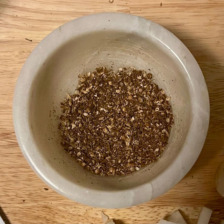 Step 1.1: After another minute, take off the heat and put in your mortar and pestle